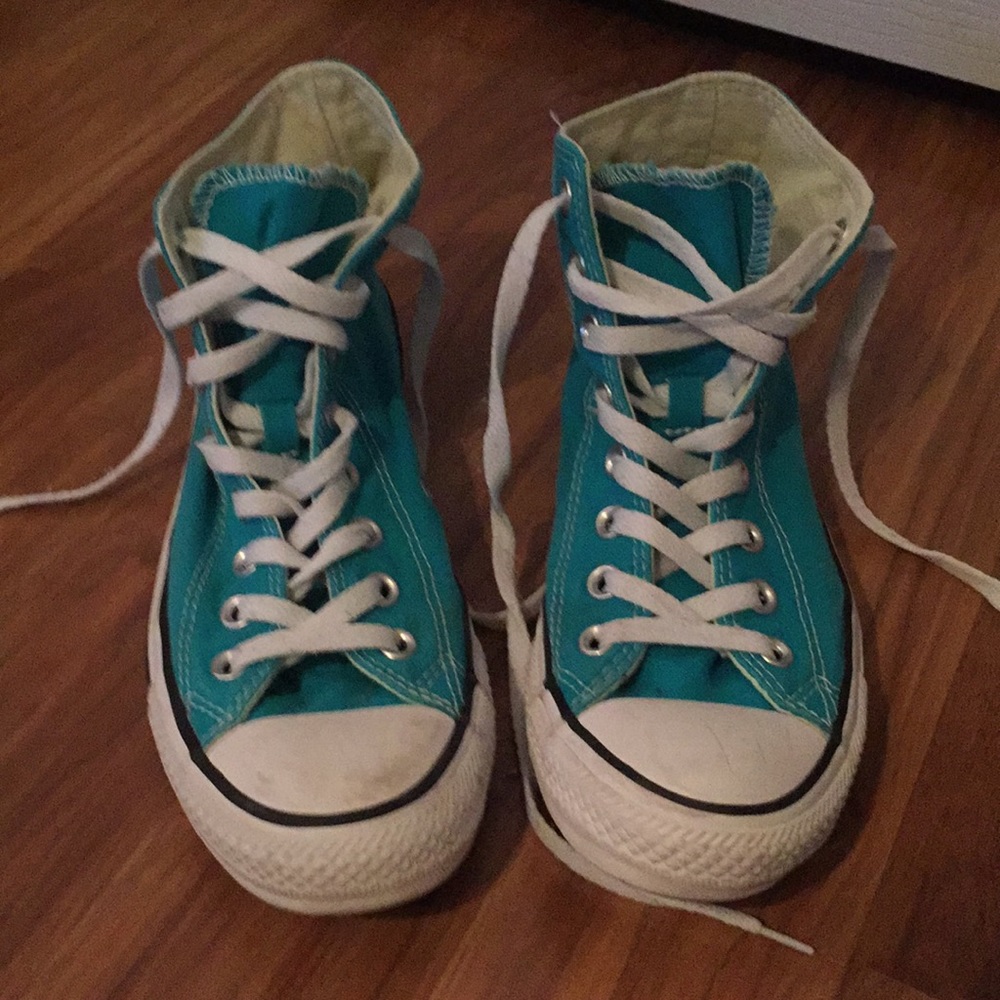 Aqua blue high-top converse sneakers